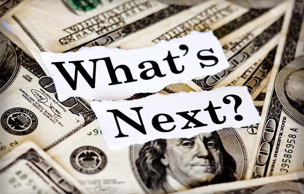 Hundred-dollar bills with the words "What's Next?"