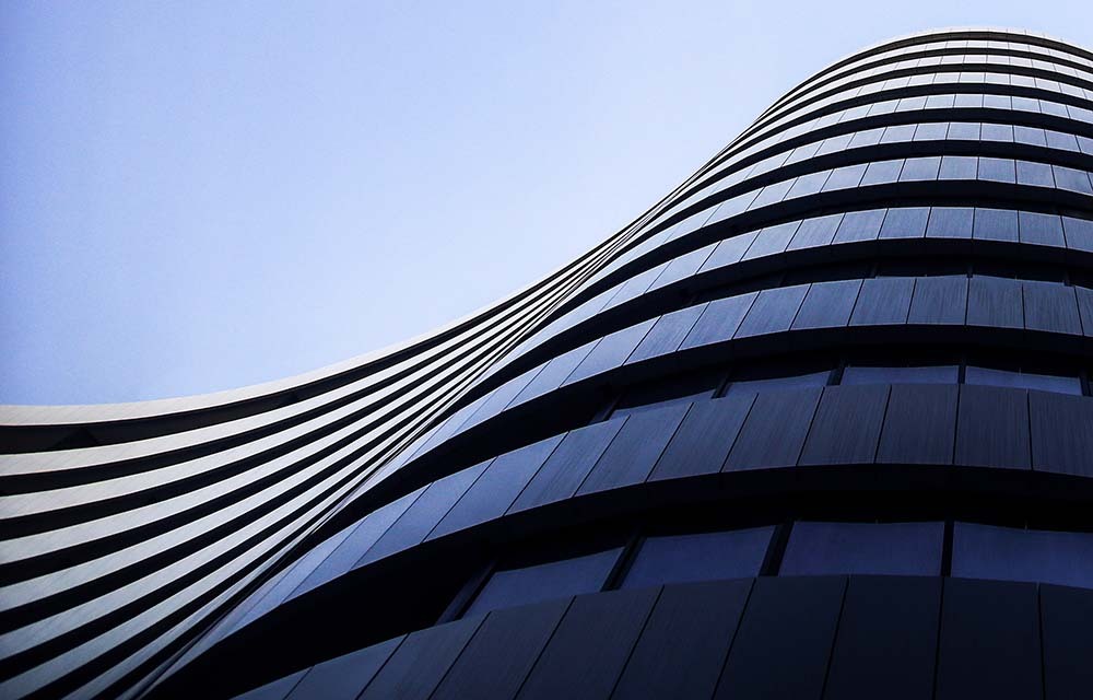 Office building exterior resembling a blue wave